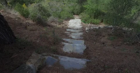 Walking down cliff stairs Stock Footage 61219711