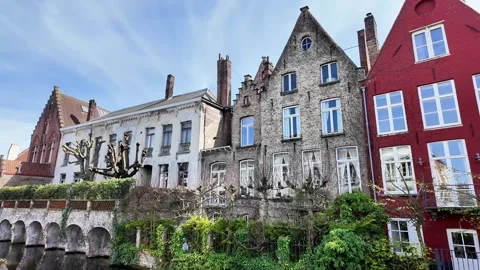 Walking down a cobblestone street lined with magnificent Gothic facades in Bruge Vídeos de archivo 333202687