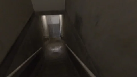 Walking Down concrete stairwell Video stock 89017633