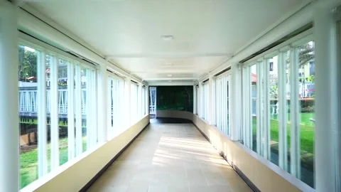 Walking down the corridor, good for background Stock Footage 296476015