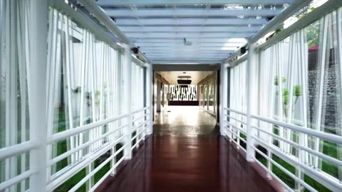 Walking down the corridor, good for background Stock Footage 296476021