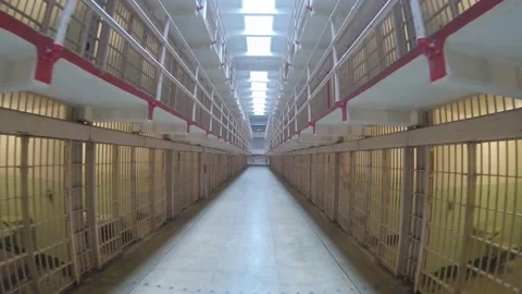 Walking down a corridor with prison cells, Alcatraz, San Francisco Video stock 148727323