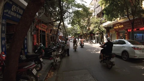 Walking down a covered busy side street in Hanoi, Vietnam, Asia Stock Footage 122083425