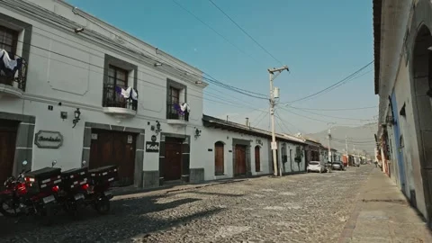 Walking down empty Antigua streets in the morning Stock Footage 296430304