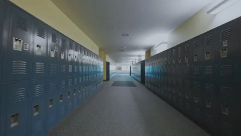 Walking down an empty hallway with lockers 스톡 동영상 141217102