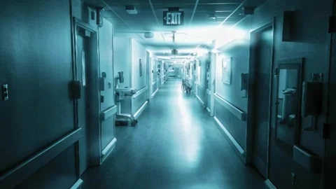 Walking down empty hospital hallway at night Vídeo Stock 270626511