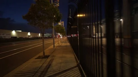 Walking down empty road in San Francisco at night Stock Footage 236812356