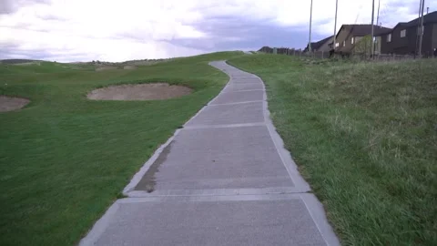 Walking down golf course Stock Footage 274113842
