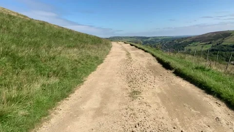 Walking down a gravel path in the countryside Stock Footage 137645682