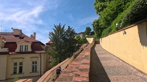 Walking Down Historic Castle Streets in Prague on a Sunny Day Stock Footage 347036913