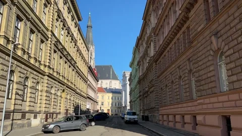 Walking down a historical street with a view of gigantic cathedral in Olomouc Stock Footage 263483787