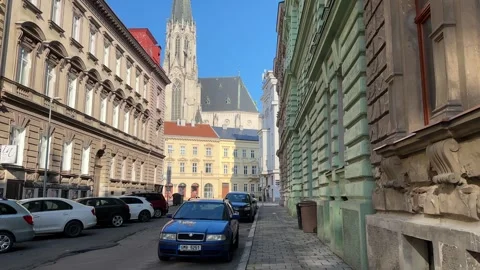 Walking down a historical street with a view of a gigantic cathedral in Olomouc Stock Footage 263483832