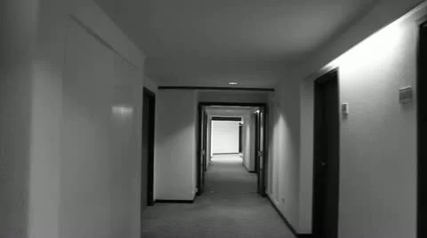 Walking down a hotel corridor Stock Footage 20587305