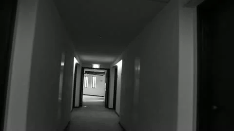 Walking down a hotel hallway Stock Footage 20588117