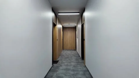 Walking Down Modern Apartment Hallway | Residential Interior 4K Video Stock Footage 325446476