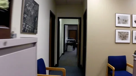 Walking down a narrow office corridor Stock Footage 46935799