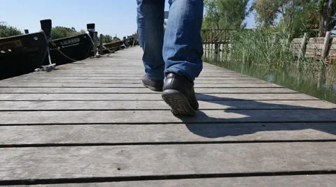 Walking Down the Pier in the Lake Stock-Footage 63305923