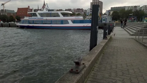 Walking down the quay and approaching a tourist boat Stock Footage 140550828