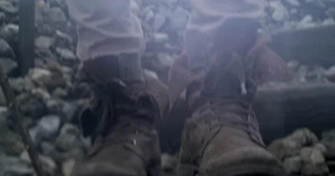 Walking down a rocky trail HD Stock Footage 12364496