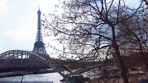 Walking Down Seine River with view of Eiffel Tower - Handheld Video stock 38911211