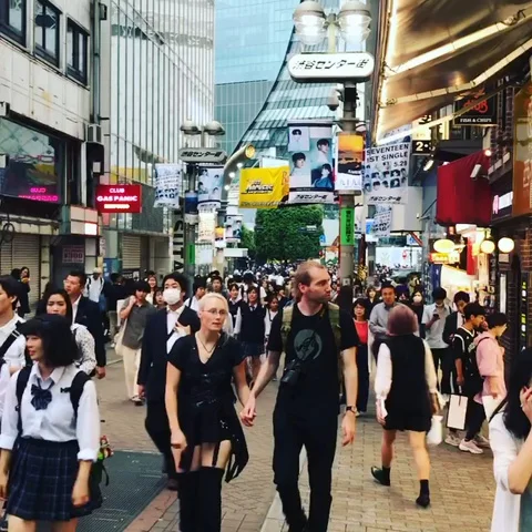 Walking Down Shibuya District Stock Footage 128079104