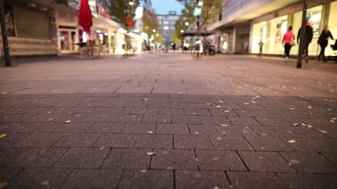 Walking down shopping district on busy summer evening, nice backgrounds Stock Footage 232667377