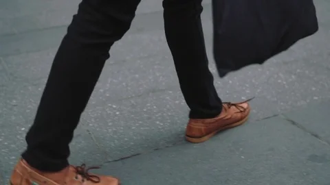 Walking down the sidewalk Stock Footage 76540785