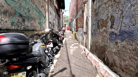 Walking down a small lane in Bandung City, West Java, Indonesia Stock Footage 319736530