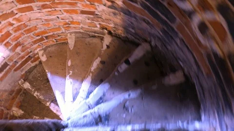 Walking Down Spiral Brick Staircase In Old Church Tower Video stock 88243658