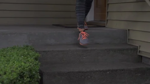 Walking down stairs with bike Stock Footage 86885091
