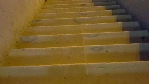 Walking down the stairs Stock Footage 136333925