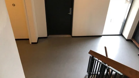 Walking Down Stairs inside Building 4K POV Stock Footage 115579781