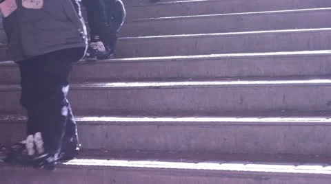Walking down stairs in ski boots Stock Footage 21482548