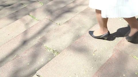 Walking down steps Stock Footage 37977863