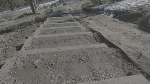 Walking down steps on trail Video stock 230110559