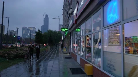 Walking down the street in the rain Stock Footage 147223427