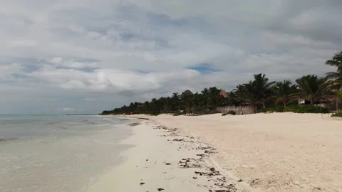 Walking Down a Tropical White Sand Beach in Tulum Mexico Stock Footage 137429427