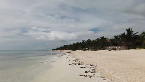 Walking Down a Tropical White Sand Beach in Tulum Mexico Stock Footage 137429436