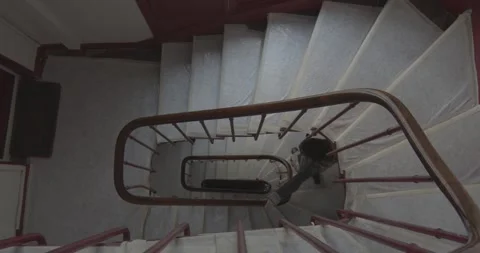 Walking down windy stairs Stock Footage 323125420