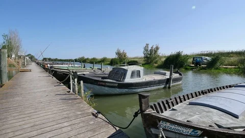 Walking Down the Wooden Dock in the River Stock Footage 80510800