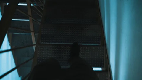 Walking downstairs Stock Footage 122166683