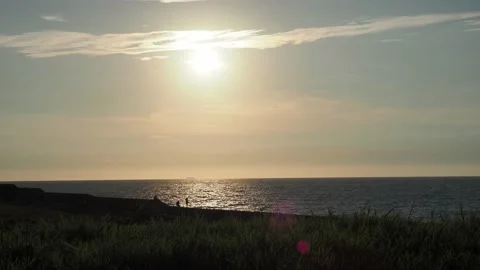 Walking at embankment under sunset Stock Footage 134401431