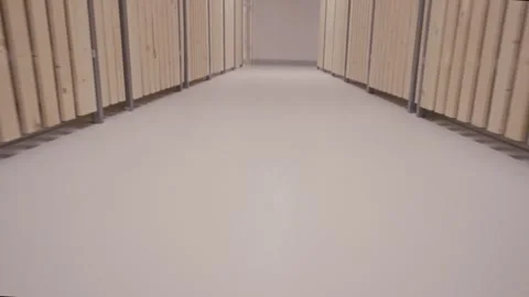 Walking in an Empty Cellar, Shot from Low Angle Stock Footage 255791146