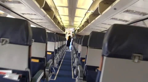 Walking off empty plane, jet Stock Footage 1120005