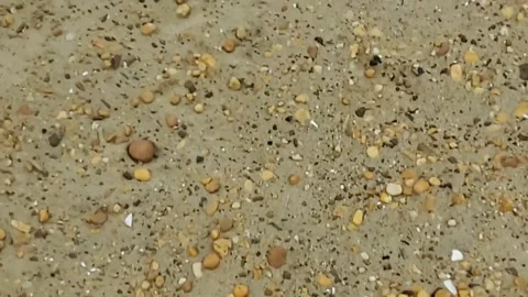 Walking fast along a deserted beach, no people 動画素材 164048675