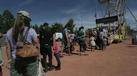 Walking up to Ferris Wheel HD Stock Footage 57983197
