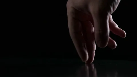 Walking fingers on a black background Stock Footage 69919760