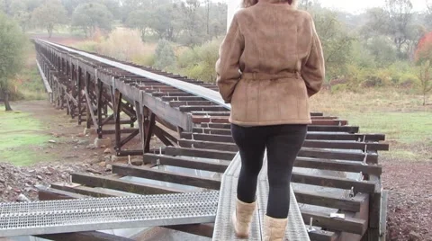 Walking on a Flume playing with danger Stockbeeldmateriaal 44685353