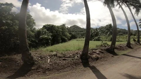 Walking forward side view in extreme distort angle of open field of pave dirt  Stock-Footage 233673733