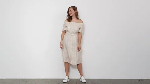 Walking In Frame and then Posing Merrily for the Camera and then Walking Out 스톡 동영상 116916046